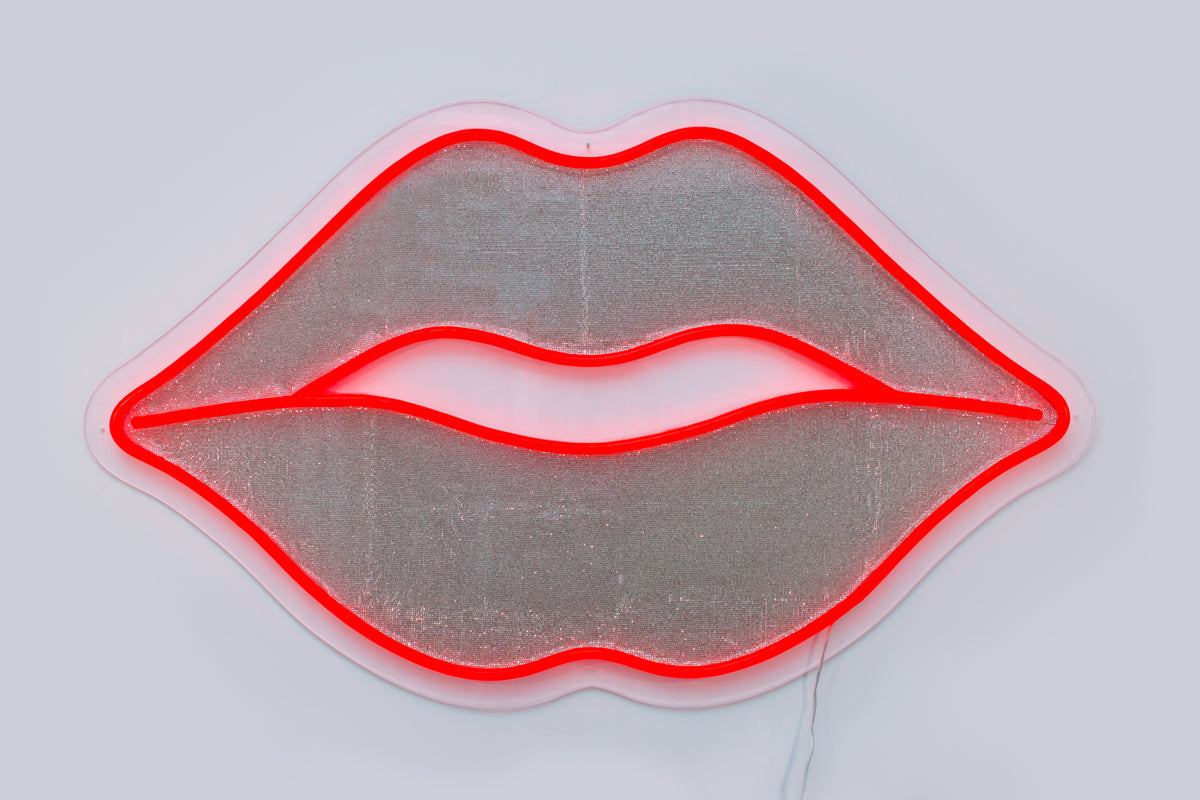 large red lips neon sign with glitters