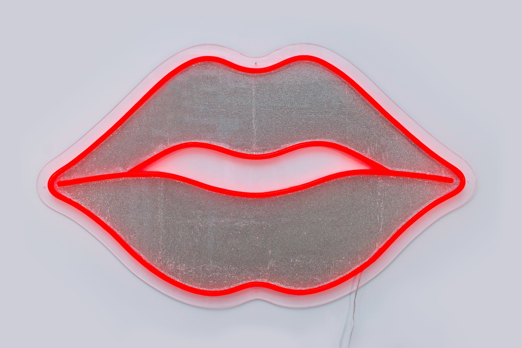 large red lips neon sign with glitters